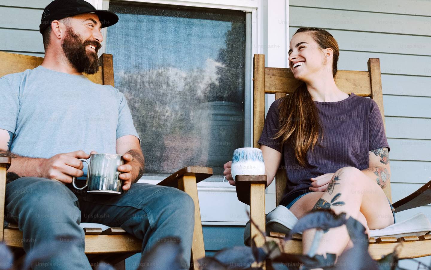 Photo of a man and a woman drinking coffee together